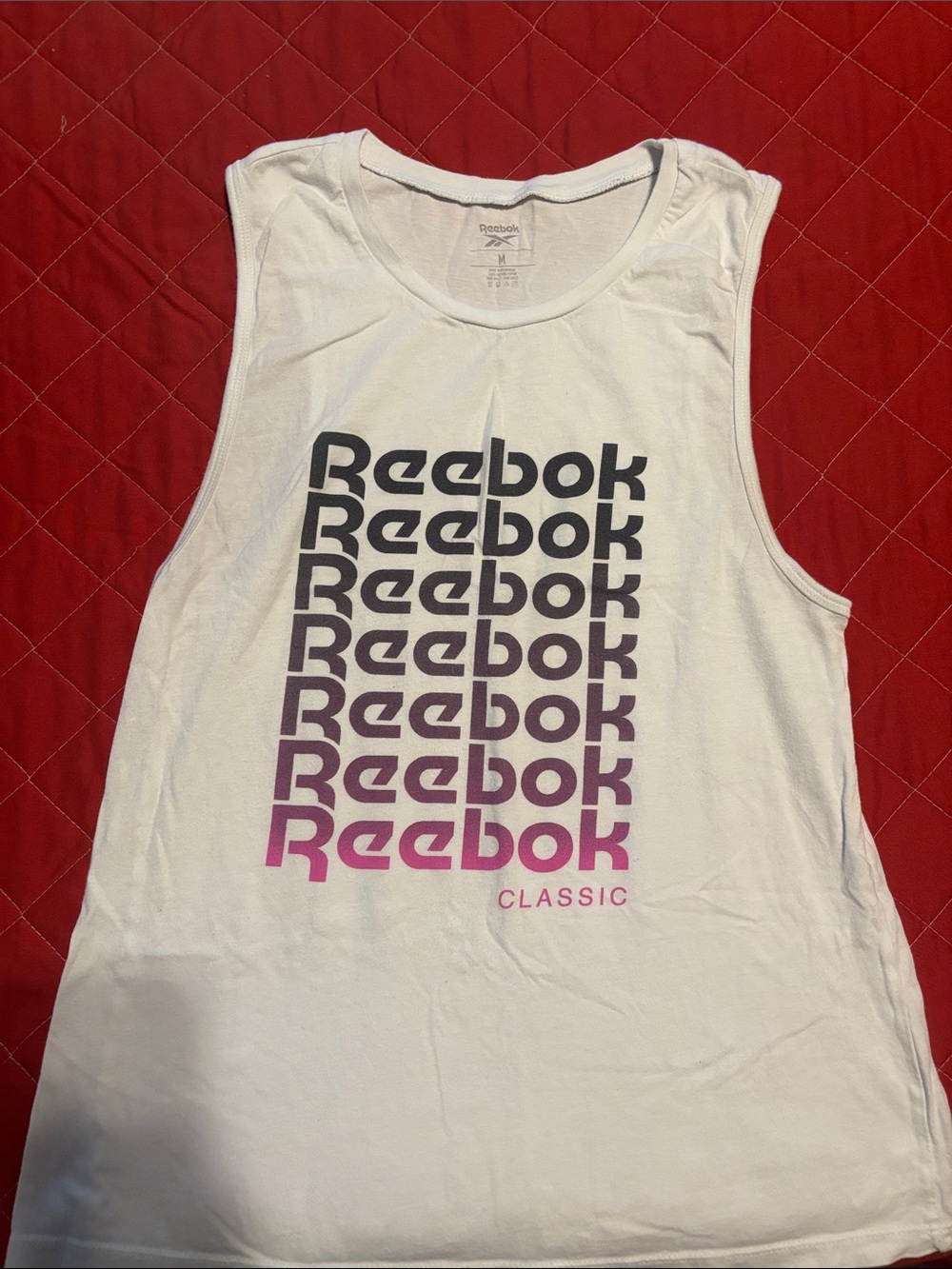 Reebok Women’s White Tank with Pink-to-Black Gradient Logo